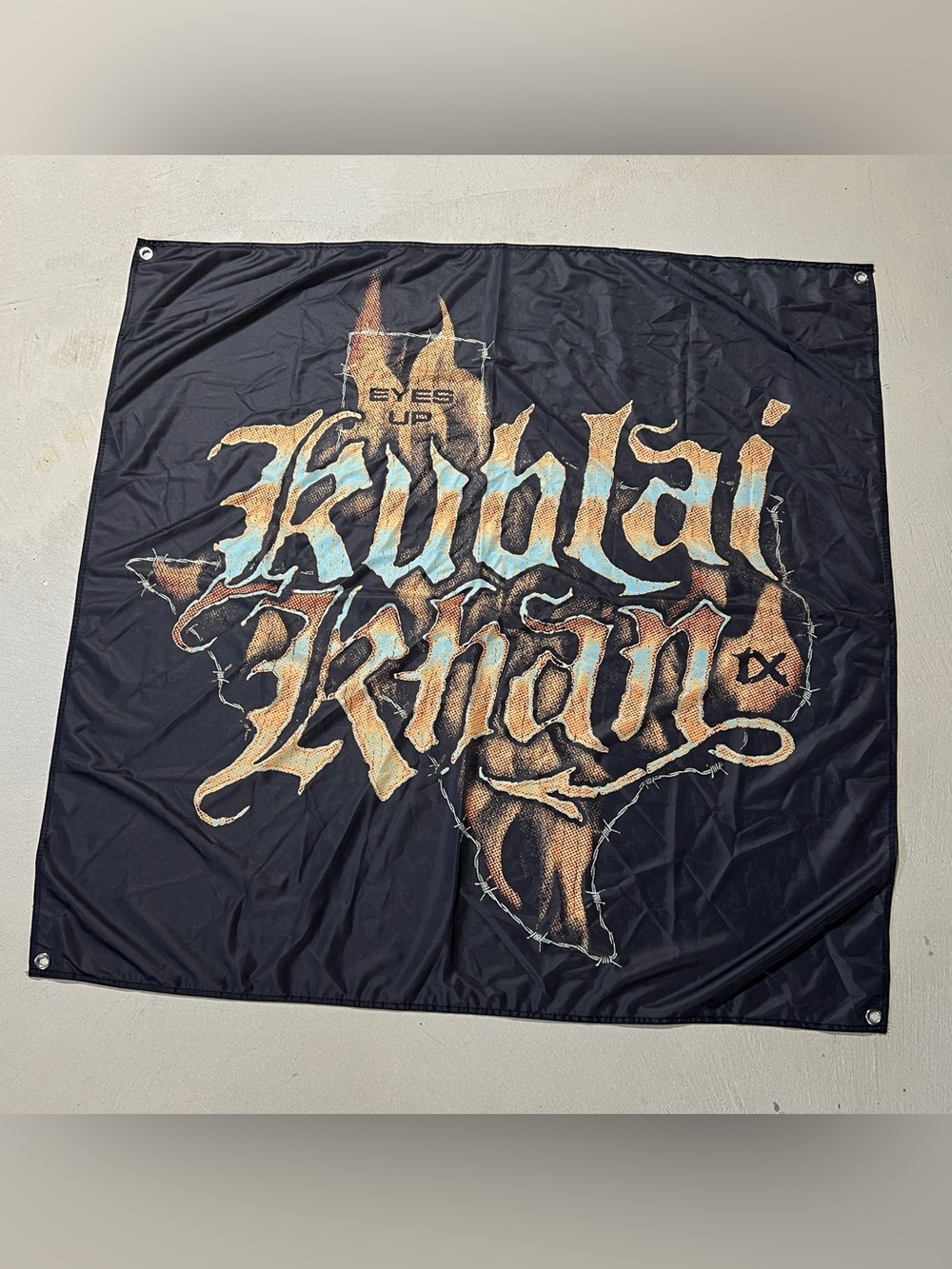 Kublai Khan TX Eyes Up Balancing Survival & Happiness Banner Flag - 4’ x 4’